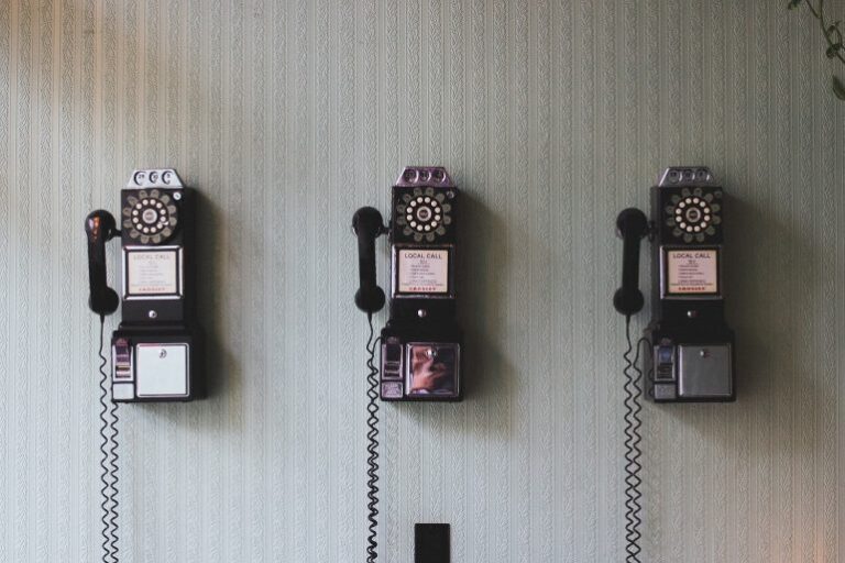 Three repeating rotary phones