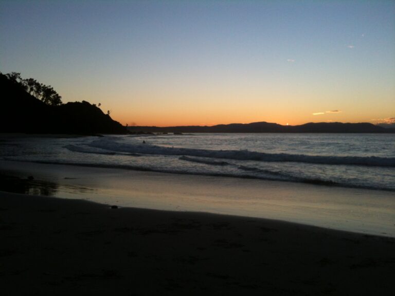 photograph of an empty beach at sunset