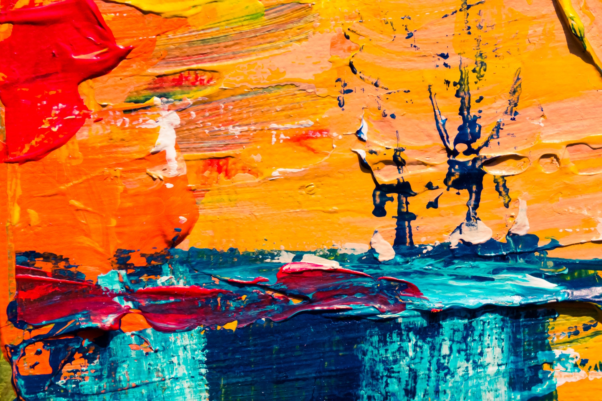 Abstract canvas art with red, orange, yellow, and blue on canvas. Oil on canvas.