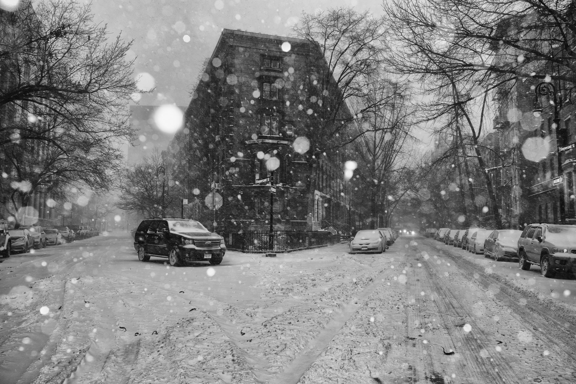 Black and white picture of a snowy street