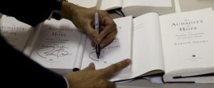 Barack Obama signing books. 