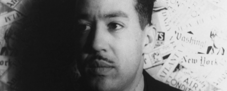 Black and white picture of Langston Hughes. 