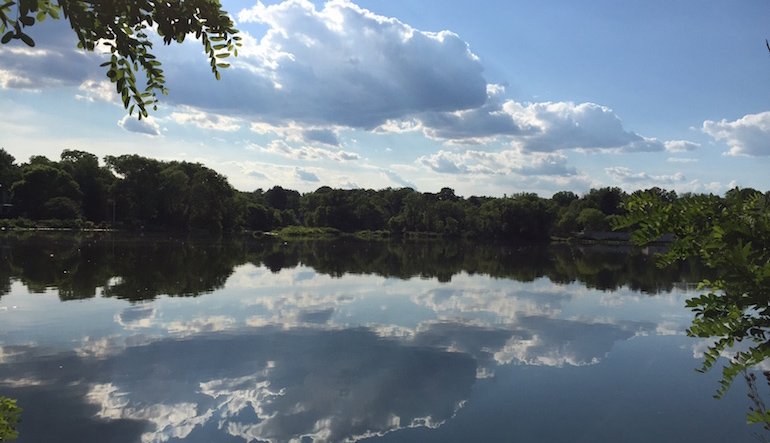 Lake reflecting the sky above.