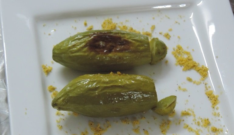 Two green stuffed peppers
