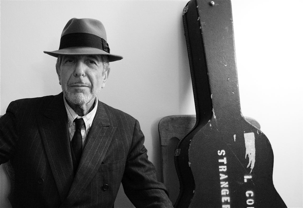 Leonard Cohen with guitar 