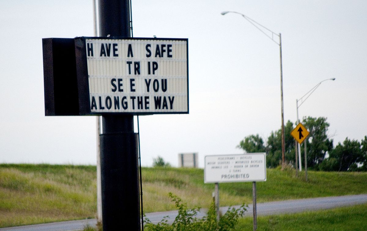 Marquee sign that reads "Have a Safe Trip See you Along the Way."