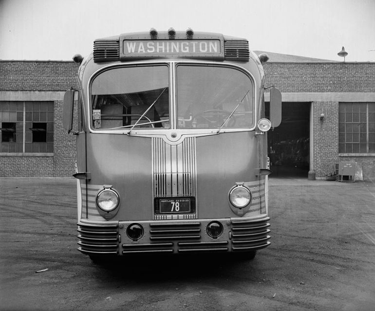 Old bus with the screen displaying the word "Washington."