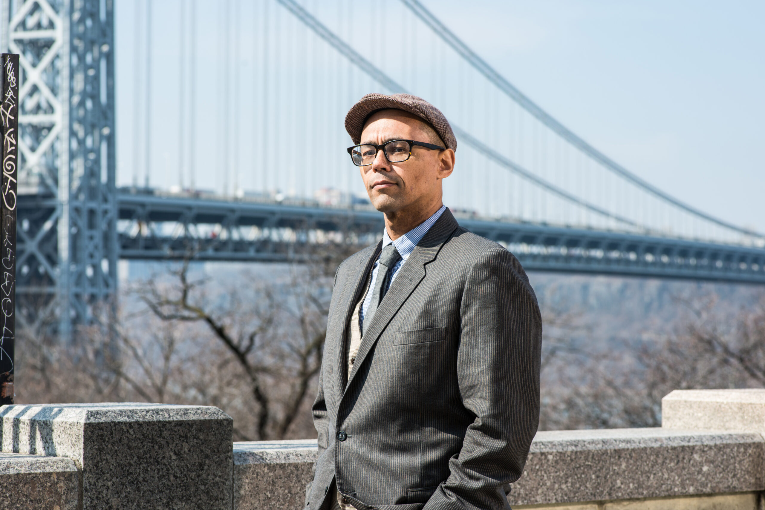 Headshot of Victor LaValle in front of a bridge.