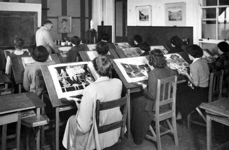 Women sitting in rows painting on canvases.