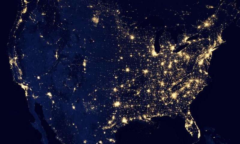 lit up aerial view of the United States at night 