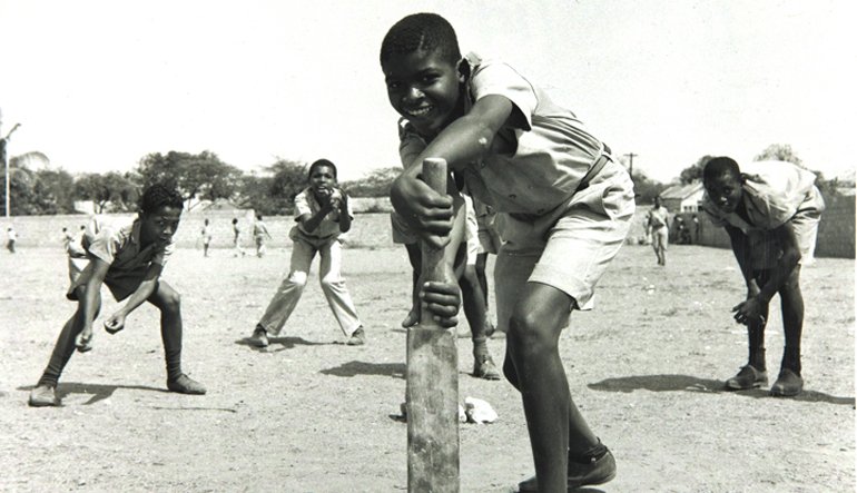Children playing in a field.