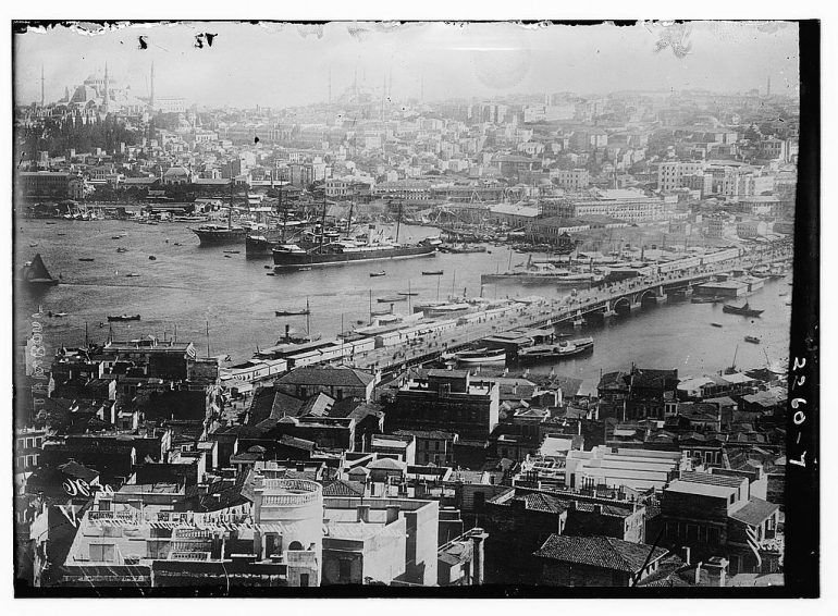 old photo of ships, boats, and docks 