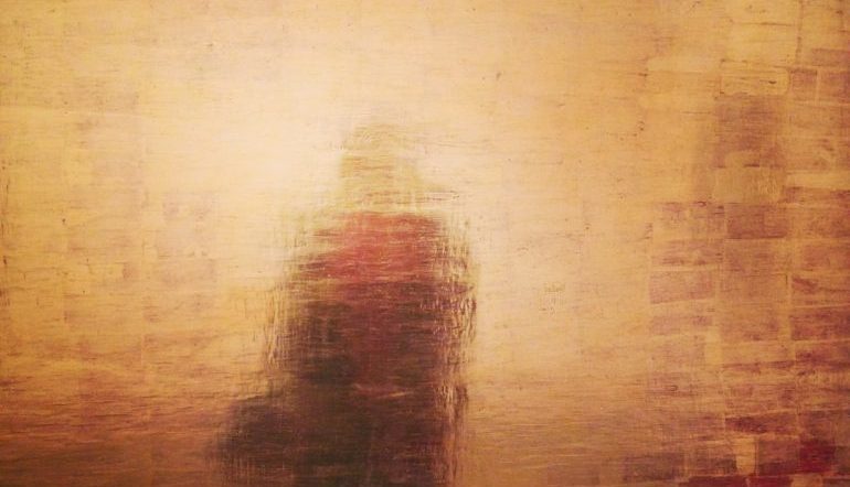 shadowy silhouette against a gold wooden-textured background