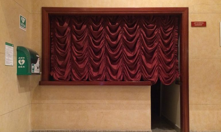 A curtain drawn over a counter
