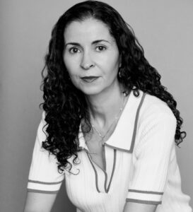 A black and white headshot of guest editor Laila Lalami.