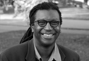 Black and white headshot of Cornelius Eady.