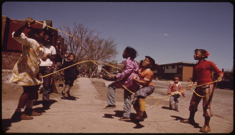 Children playing jump rope.